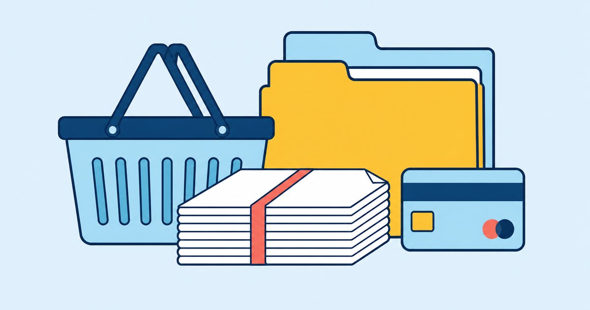 A shopping basket, file folders, a paper bundle, and a bank card are arranged on a tabletop