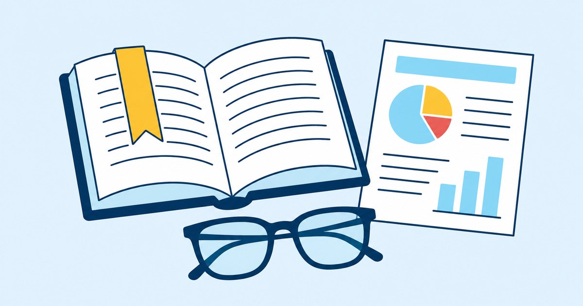An open book, a bookmark, a report sheet, and reading glasses are arranged on a library table